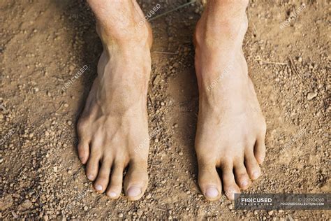 Male Feet Barefoot Stock Photos, Images & Pictures